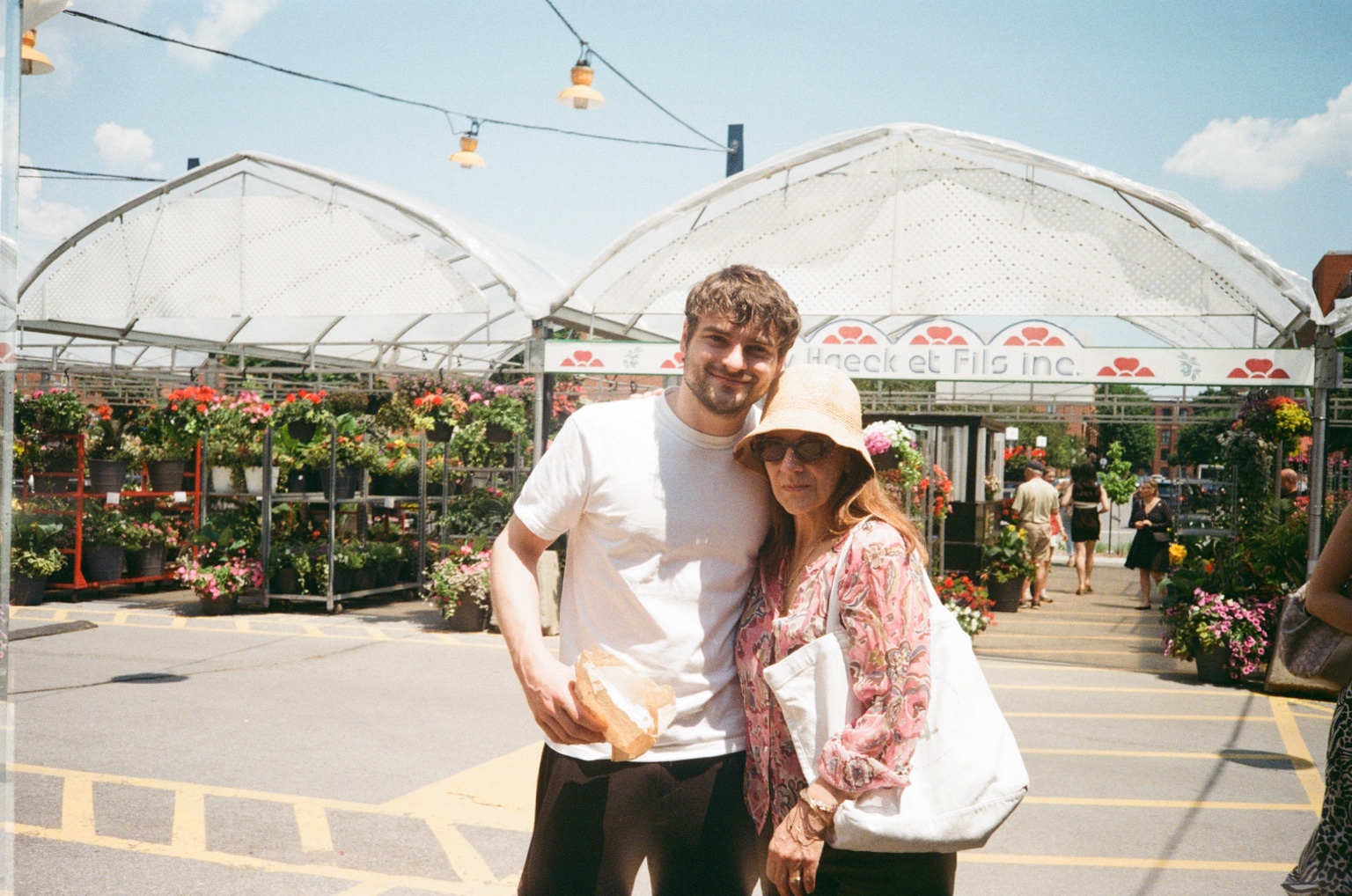 James and Mom at the market, June 2026
